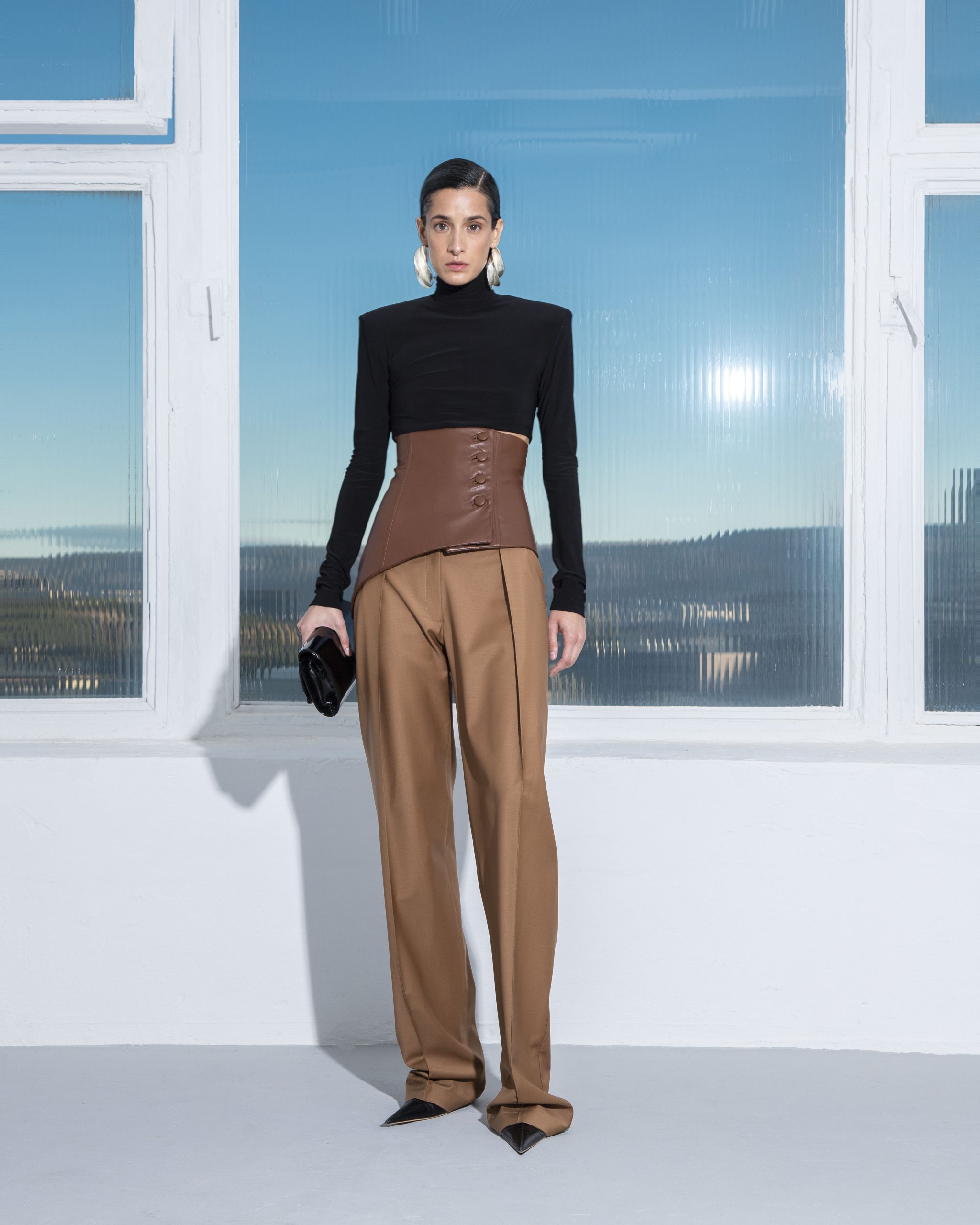 https://akhalkatsishvili.com/wp-content/uploads/2023/01/black-turtleneck-top-and-brown-corset-pants-scaled.jpg